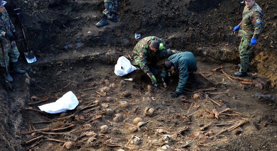 Gestapo murders mass grave human remains Oblast, Ukraine